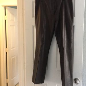 Brown leather pants.